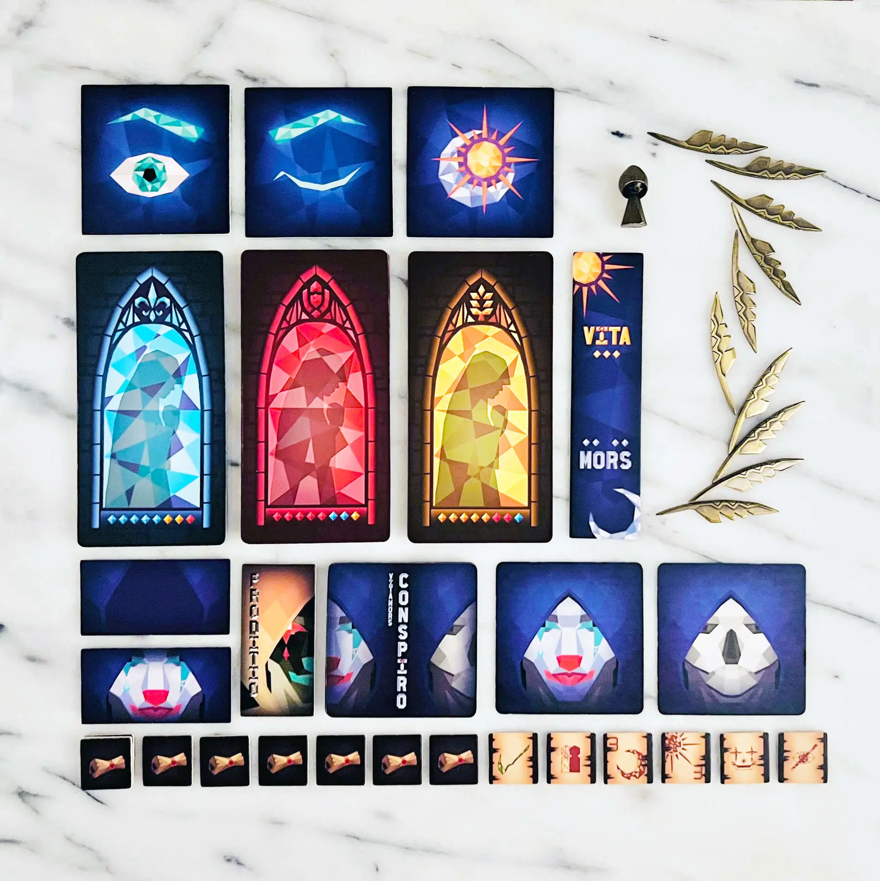 All cards, tokens, metal feathers, and the metal Reaper included in Vitamors Conspiro